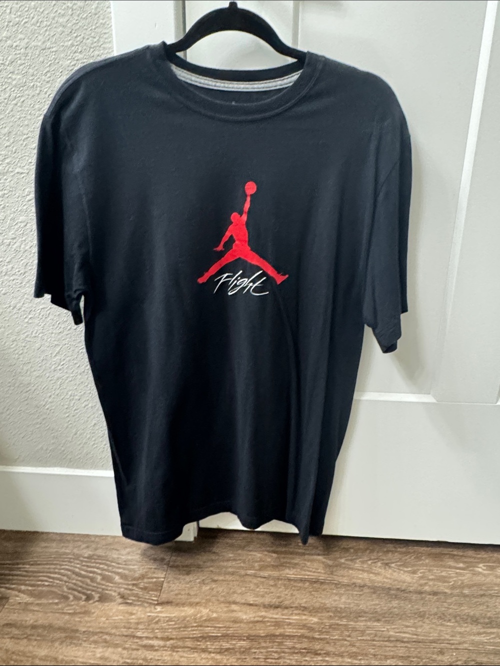 Jordan Black Short Sleeve Tee with Red Jumpman